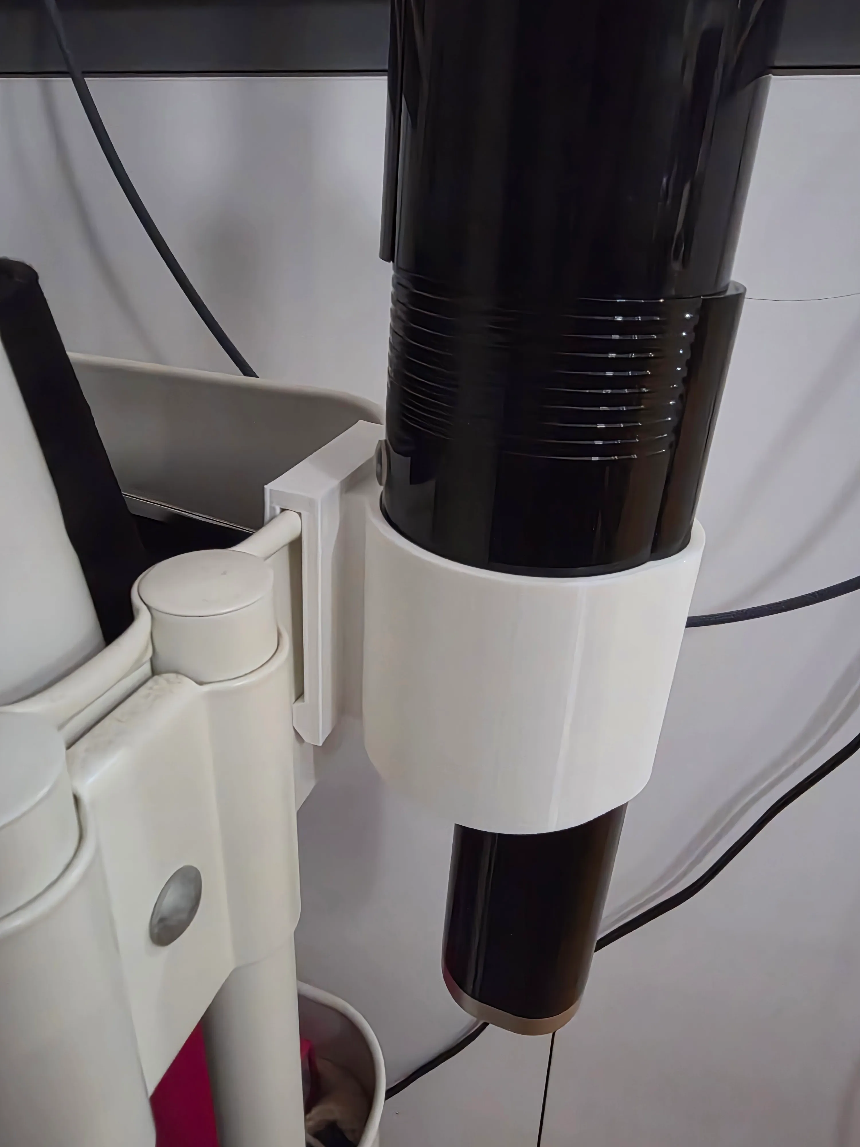 The vacuum holder installed on an IKEA cart